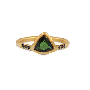 Jeanie ring shown in 14K yellow gold This ring features a gorgeous triangle Tourmaline center stone (approx 8mm by 10mm) with 3 1.1mm black diamonds on either side
