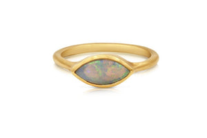 our Addison ring in 14 yellow gold with marquis shaped opal center stone
