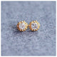 Jocelyn Earrings in 14K yellow gold with white sapphires with round white sapphire stones in each on gray background