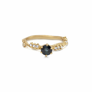 Anais ring in 14 K yellow gold with round blue tourmaline center and 7 champagne side diamonds