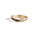 Wave Channel ring shown in 14k yellow gold with 6 black diamonds and 6 gray diamonds on either side