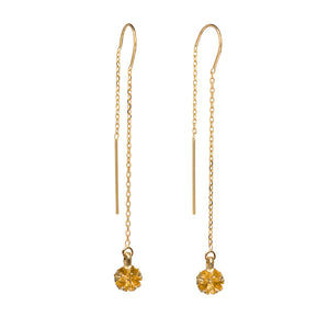 Amelia flower threader earrings in 14K yellow gold. These delicate Flower Bud Thread Earrings are perfect for everyday wear and elegant enough for a night out. The bud measures 5mm wide x 8mm long including the jumpring. They hang approximately 1.4 inches from the ear lobe. 