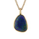 Our opal bezel pendant in 14K yellow gold with dark blue opal
