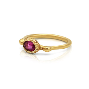 Side view of Odette ring in 14K Yellow gold with oval shaped Rubellite center stone