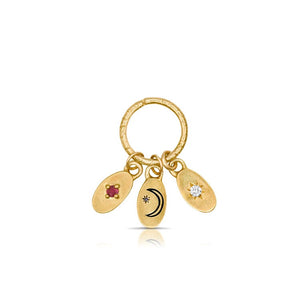Lucia moon pendant with carved moon and star with white round diamond in 14K yellow gold  on charm holder with other charms (sold separately)