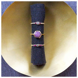 Hexagon center stone ring with hexagon shaped ruby in 14K yellow gold.