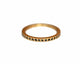 Our Polly eternity band shown in 14K yellow gold This classic diamond band features 36 black diamonds all the way around