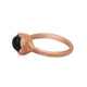 Side view Our Willa ring in 14K rose gold shown with black sapphire
