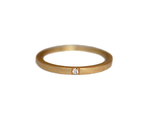 Our Sophia ring in 14K yellow gold features Four white diamonds set in the front, both sides and back