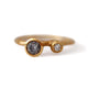 Double Bud ring shown in 14K yellow gold with a gray and white diamond.