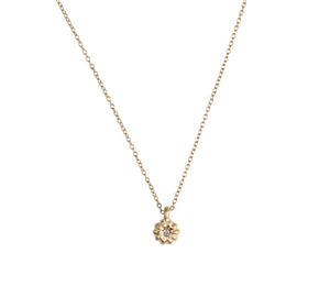 Our blossom diamond pendant shown in 14K yellow gold with white diamond