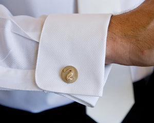 Lulu &amp; Shay Handmade Fine Jewelry Seahorse Cufflinks. These seahorse cufflinks are perfect for any occasion.   ﻿The seahorse is considered to be a symbol of strength and power and is also known for it's friendliness and generosity.   They measure 3/4 of an inch in diameter.  Price is for Sterling Silver. Shown in 14K Gold.