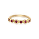 Our Lanie ring in 14K yellow gold motif of alternating round and marquise shapes and dainty milgrain detailing with 7 gorgeous rubies