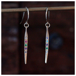 Sold individually you can spell out your own message or name with our Message Me Earrings. Shown are DREAM  and LOVED