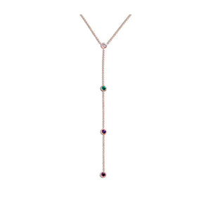 Message Me Necklace showing the word DEAR Our Message Me Necklace features 3mm stones in a Y shape spelling out a secret message of your choice. Shown in this picture is DEAR - Diamond (gray) , Emerald, Amethyst, and Ruby.