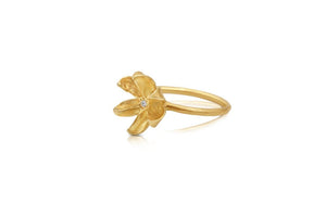 Side view of Our Molly flower bud ring in 14K yellow gold with white round diamond center stone