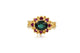 Simone ring with Green tourmaline oval center stone and 8 pink sapphires in 14K yellow gold