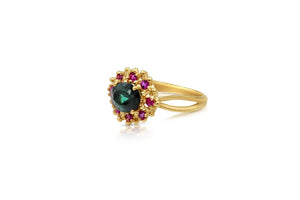 Our Simone ring features a gorgeous Green Tourmaline oval center stone (6x8mm) with 8 pink sapphires stones (.24tcw) side view