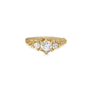 Jocelyn ring shown with white sapphire center and side stones. Ring shown in 14K yellow gold.