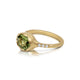 Side View Scallop bezel ring with tourmaline center stone and white diamonds on both sides. Shown in 14K yellow gold.