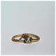 Our Lita ring in 14K yellow gold with 1ct round gray diamond center stone