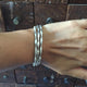 Handmade Fine Jewelry Seaweed Bangle Sterling Silver shown 3 on a wrist