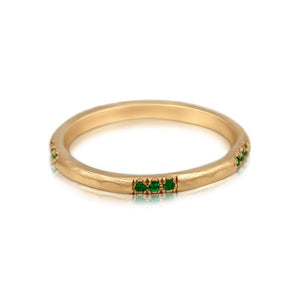 Textured diamond band in 14K yellow gold with 15 white round emeralds in 5 sets of 3 around the band