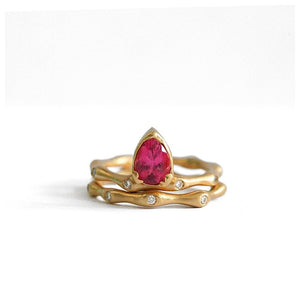 Seaweed Pear Center Tourmaline with diamonds with seaweed diamonds both in 14K Yellow gold