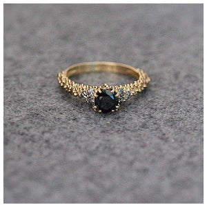 Michaela Ring with Black and Gray Diamonds in 14K yellow gold on gray background