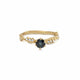 Anais ring in 14 K yellow gold with round blue tourmaline center and 7 champagne side diamonds