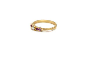 Side view of Ariana ring in 14K yellow gold with white diamond and pink and purple sapphires