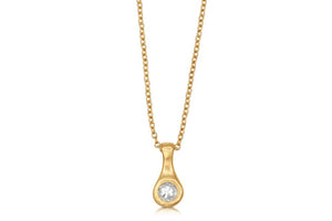 Our Evelyn pendant shown in 14K yellow gold with a white sapphire.