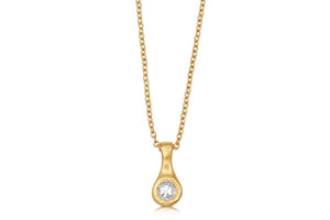 Our Evelyn pendant shown in 14K yellow gold with a white sapphire.