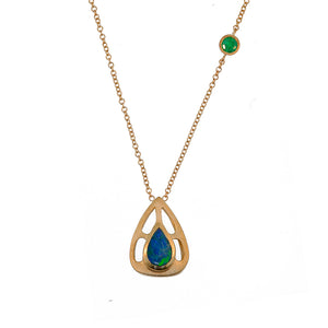 Maria pendant features a beautiful pear shaped dark blue and green opal center stone set in a rich 14K yellow gold. and round emerald stone on the chain.