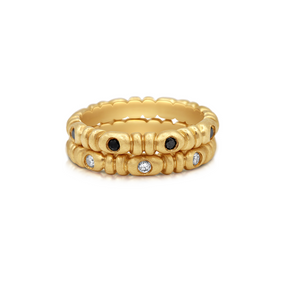 Mimi ring 2 stacked both in 14K Yellow gold one with white diamonds and one with black diamonds.
