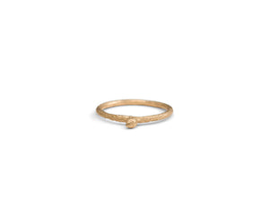 Our twig bud ring in 14K yellow gold with single bud