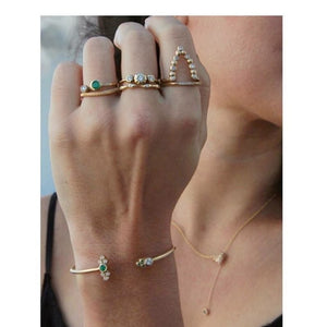 Beatrix ring in 14K yellow gold with diamonds shown on hand with other rings sold separately