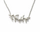 This elegant necklace is shown in sterling silver. This elegant necklace is shown in sterling silver. It can be paired with our Long Coral Earrings, or Coral Long Ring  The handcrafted coral pendant measures 1 1/4 of an inch across﻿ and hangs from a 16" chain.