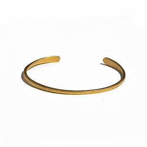 Penelope Cuff Bracelet Available in 14K, 18K or 18K Gold-plated. Our new Penelope Cuff Bracelet is perfect for everyday wear and they are fully adjustable so you can wear them loose or tighter on the wrist.  It measures approximately 2mm wide with rounded ends. Can be ordered in a hammered, plain or Organic Texture.