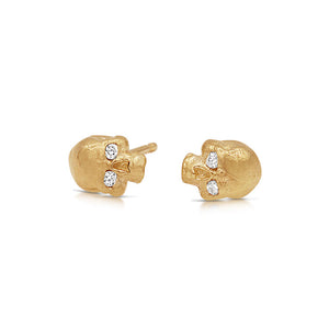 Skull earring in 14K yellow gold with 2 round diamonds for eyes in each