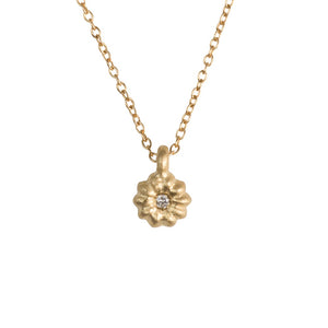 Our blossom diamond pendant shown in 14K yellow gold with white diamond