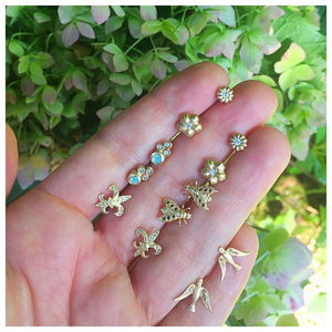 Gloria Flower Studs with White diamonds shown with other earring studs sold separately