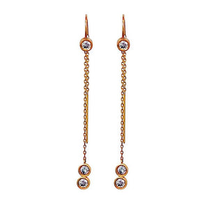 Franny threader earring in 14K yellow gold and 3 round gray diamonds in each one on top and 2 on bottom