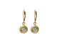 Carved earrings with one round white diamond in each in 14K yellow gold with leverback earring component