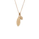 Our double leaf pendant shown in 14K yellow gold with one large and one small leaf.