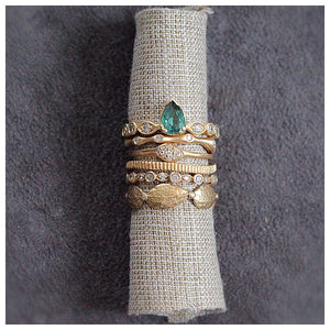 Greta Ring with Tourmaline and Gray Diamonds shown with other rings