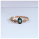 Greta Ring with Tourmaline pear shaped center stone and Gray Diamond side stones in 14K Yellow gold