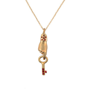 Our hand and key pendant in 14K gold with rubies
