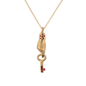 Our hand and key pendant in 14K gold with rubies