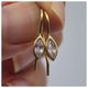 Harper earrings in 14K yellow gold with moonstones